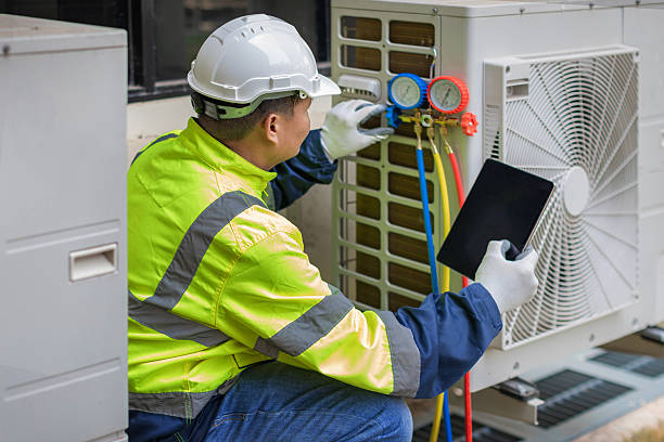Professional Air Conditioning Repair technician working in Otis Orchards, WA